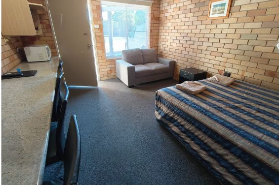 Large 2-Bedroom Unit - bed and sofa